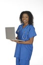 African American woman doctor or nurse holding a laptop computer