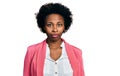 African american woman with afro hair wearing business jacket looking sleepy and tired, exhausted for fatigue and hangover, lazy