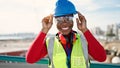 African american woman architect smiling confident wearing hardhat at street Royalty Free Stock Photo