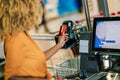African American Woman with bank card buying food at grocery store or supermarket self-checkout Royalty Free Stock Photo