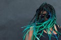 African American Woman with Beautiful Teal Green Blue Braids