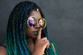 African American Woman with Beautiful Teal Green Blue Braids