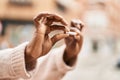 African american woman breaking cigarette at street Royalty Free Stock Photo