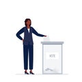 An African-American woman in business suit voting. Royalty Free Stock Photo