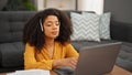 African american woman call center agent having video call working at home Royalty Free Stock Photo