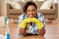 African american woman cleaning at home Royalty Free Stock Photo