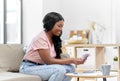 African american woman counting money at home Royalty Free Stock Photo