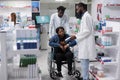 African american woman with disability shopping in drugstore Royalty Free Stock Photo