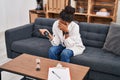 African american woman doctor patient stressed having psychology session at psychology center Royalty Free Stock Photo