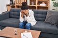 African american woman doctor patient stressed having psychology session at psychology center Royalty Free Stock Photo