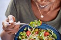African american woman eating fresh healthy salad Royalty Free Stock Photo