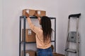 African american woman ecommerce business worker organize packages at office Royalty Free Stock Photo