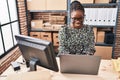 African american woman ecommerce call center agent working at office Royalty Free Stock Photo