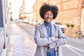 African american woman executive smiling confident standing with arms crossed gesture at street Royalty Free Stock Photo