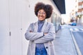 African american woman executive smiling confident standing with arms crossed gesture at street Royalty Free Stock Photo