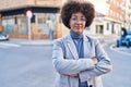 African american woman executive smiling confident standing with arms crossed gesture at street Royalty Free Stock Photo