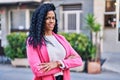 African american woman executive standing with arms crossed gesture at street Royalty Free Stock Photo