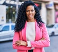 African american woman executive standing with arms crossed gesture at street Royalty Free Stock Photo