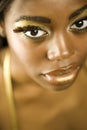 African American Woman With Golden Makeup Royalty Free Stock Photo