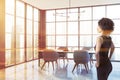 African American woman in gray dining room Royalty Free Stock Photo