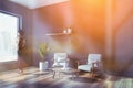 African American woman in gray living room Royalty Free Stock Photo