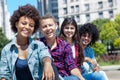 African american woman with group of multicultural young adults in a row Royalty Free Stock Photo