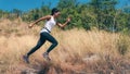 African american woman having exerice with trail running at natural mountain