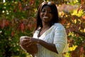 African-American woman holds football Royalty Free Stock Photo