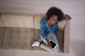 African american woman at home with digital tablet top view Royalty Free Stock Photo