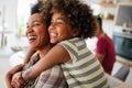 African american woman hugging her smiling teen daughter. Family love single parent child concept Royalty Free Stock Photo