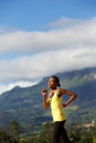 African american woman jogging outdoors in nature Royalty Free Stock Photo