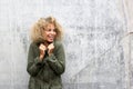 African american woman keeping warm with jacket