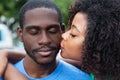 African american woman kissing boyfriend