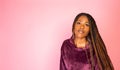 African American woman on pink background