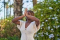 African american woman praying with closed eyes at park Royalty Free Stock Photo