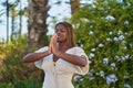 African american woman praying with closed eyes at park Royalty Free Stock Photo