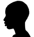 African American woman, African profile picture, silhouette. Girl from the side with very short hair. silhouette Royalty Free Stock Photo