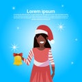 African american woman red hat hold gift happy new year merry christmas concept flat female cartoon character blue Royalty Free Stock Photo