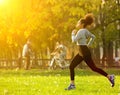 African american woman running outdoors Royalty Free Stock Photo