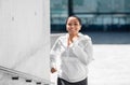 African american woman running upstairs outdoors