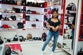 African-american woman shopping at shoes store. Royalty Free Stock Photo