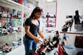 African-american woman shopping at shoes store. Royalty Free Stock Photo