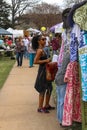 African American woman shops at clothing booth at spring garden show Tulsa Oklahoma USA 4 13 2018