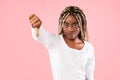 African American woman showing thumbs down sign gesture Royalty Free Stock Photo