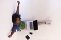 African american woman sitting on floor with laptop top view Royalty Free Stock Photo