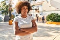 African american woman standing with arms crossed gesture and serious expression at park Royalty Free Stock Photo
