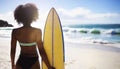woman with surfboard looking at the ocean waves on the beach Royalty Free Stock Photo