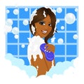 African american woman taking a bath with sponge and bubble foam