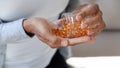 African American woman taking nutritional supplements at home Royalty Free Stock Photo