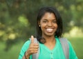 African American woman thumbs up